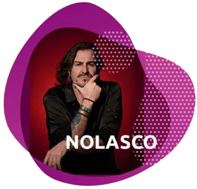 Portrait of singer Nolasco in a black jacket, hand on his chin, against a magenta background.