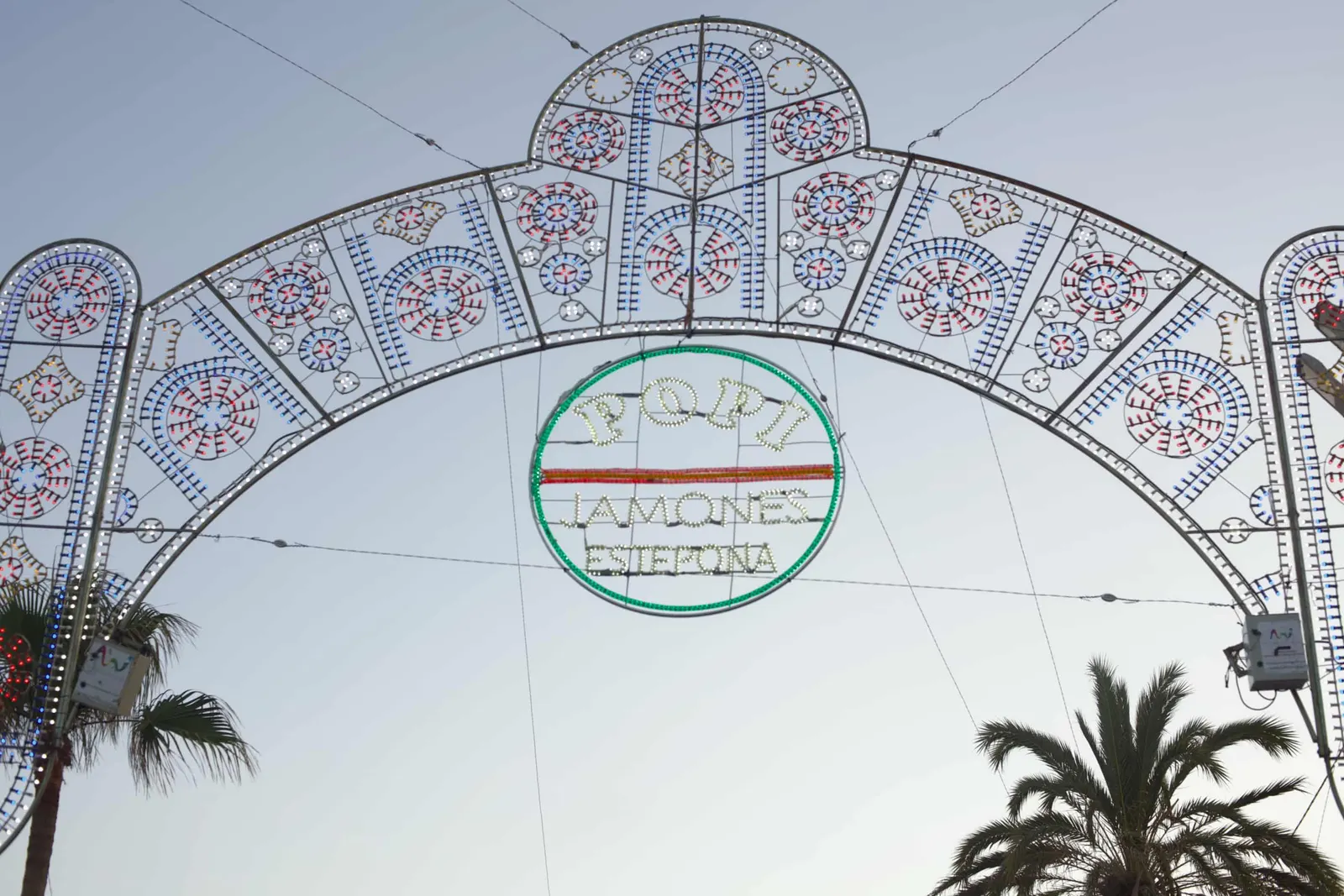 The arch of lights at the entrance to the promenade during the Certamen, 2025