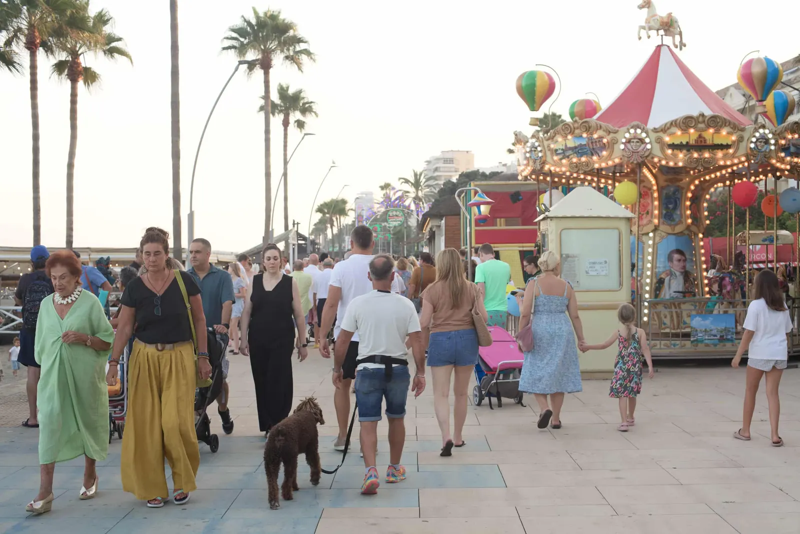 The Certamen marquees along the promenade, with the Ferris wheel in the background, 2025